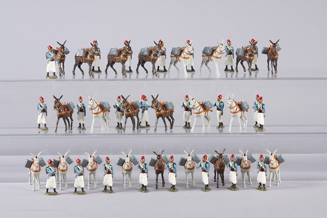 Appraisal: A similar lot of metal packmules with loads and figures