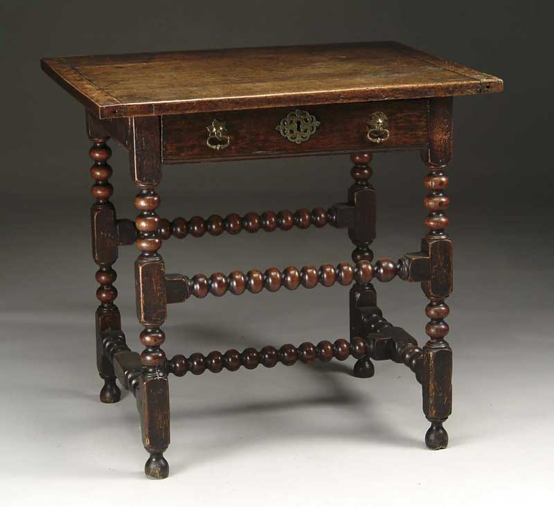 Appraisal: CHARLES II OAK OR WALNUT ONE DRAWER TABLE The breadboard