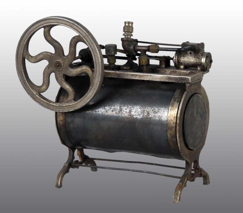 Appraisal: Peerless Horizontal Overtype Steam Engine Toy Description The boiler and