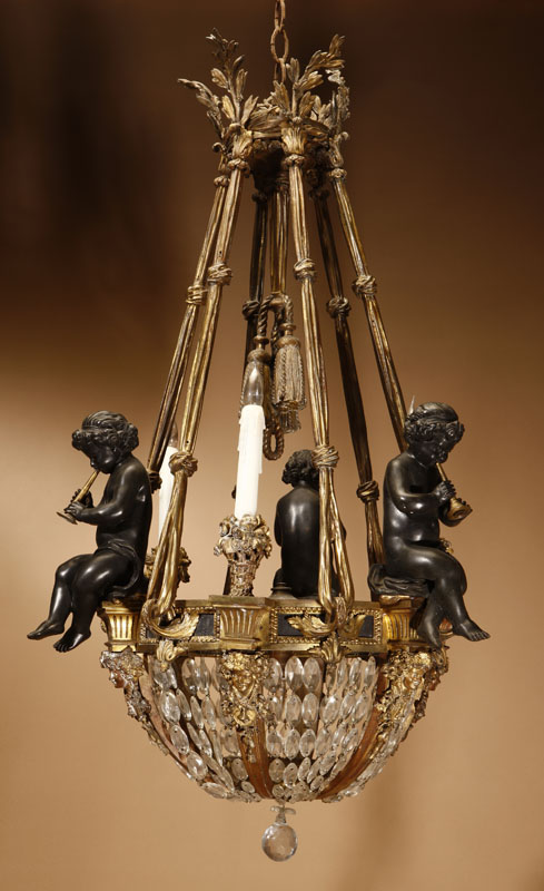 Appraisal: A Louis XVI style ormolu patinated bronze and cut-glass figural