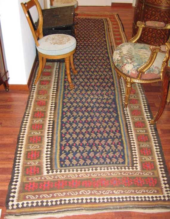 Appraisal: KILIM old Blue central field with stylized boteh motifs in