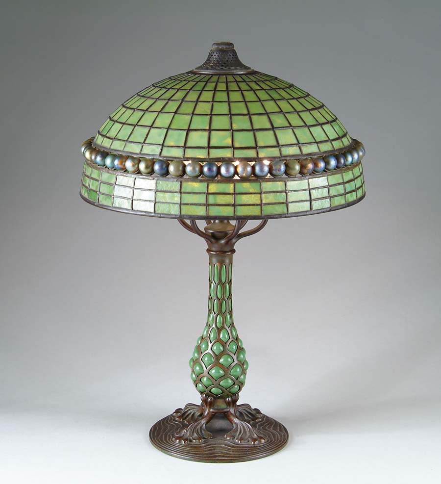 Appraisal: TIFFANY GEOMETRIC AND FAVRILE GLASS BALL LAMP Heavily mottled green