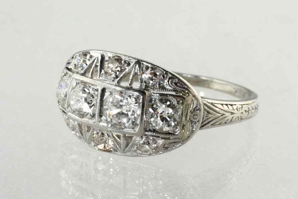 Appraisal: LADY'S RING - One antique platinum ring set with diamonds