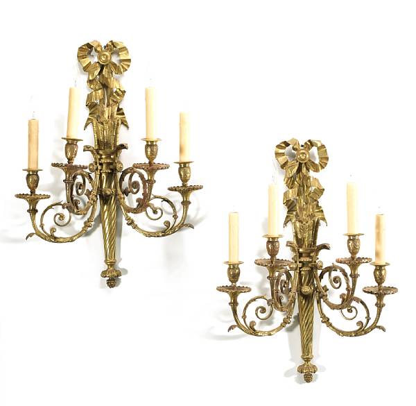 Appraisal: A pair of Louis XVI gilt bronze four light bras