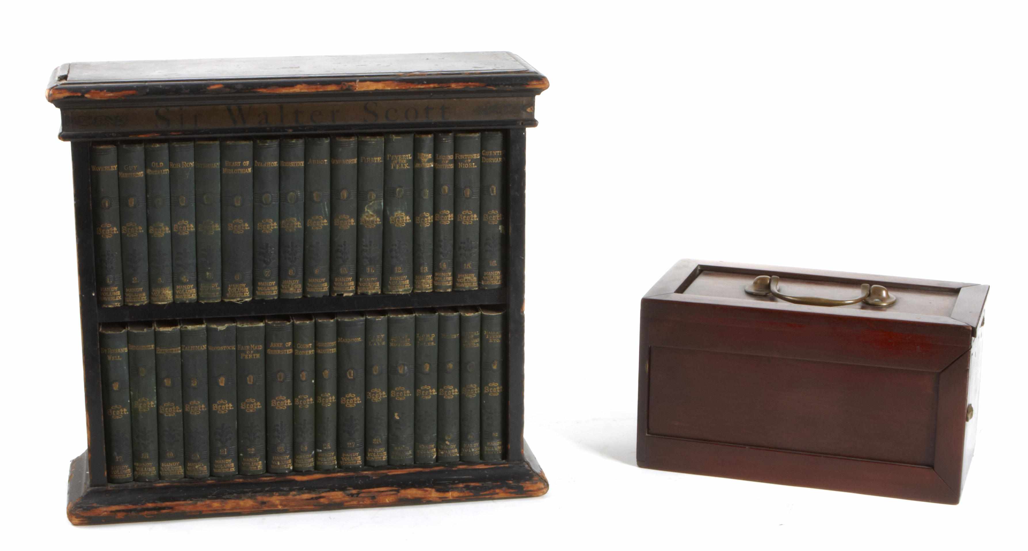 Appraisal: Property of various owners An ebonized bookcase containing thirty-two volumes