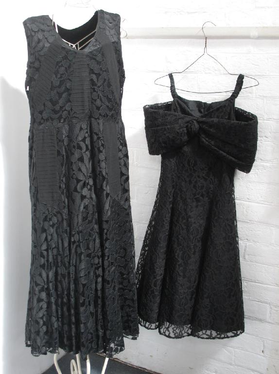 Appraisal: A black lace sleeveless dress with V -neckline and one