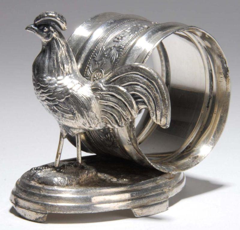 Appraisal: Rooster Figural Napkin Ring Description Rooster stands on a triple