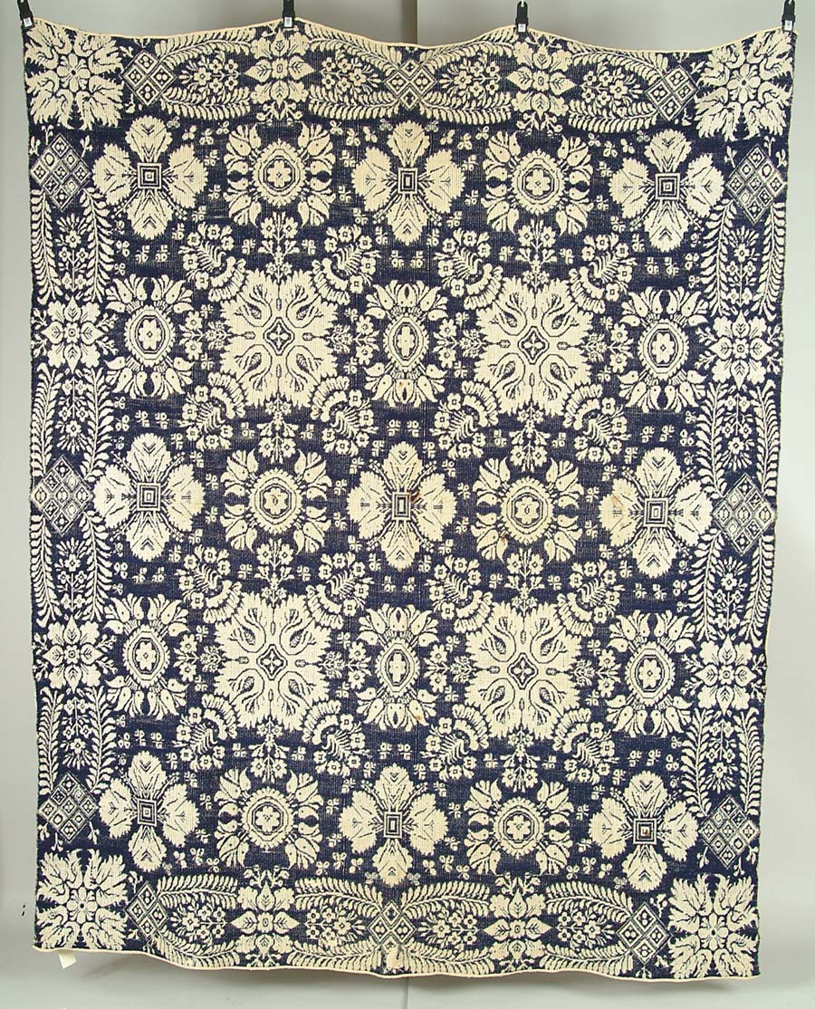 Appraisal: BLUE AND WHITE HOMESPUN SUMMER WINTER COVERLET Floral decorated unsigned