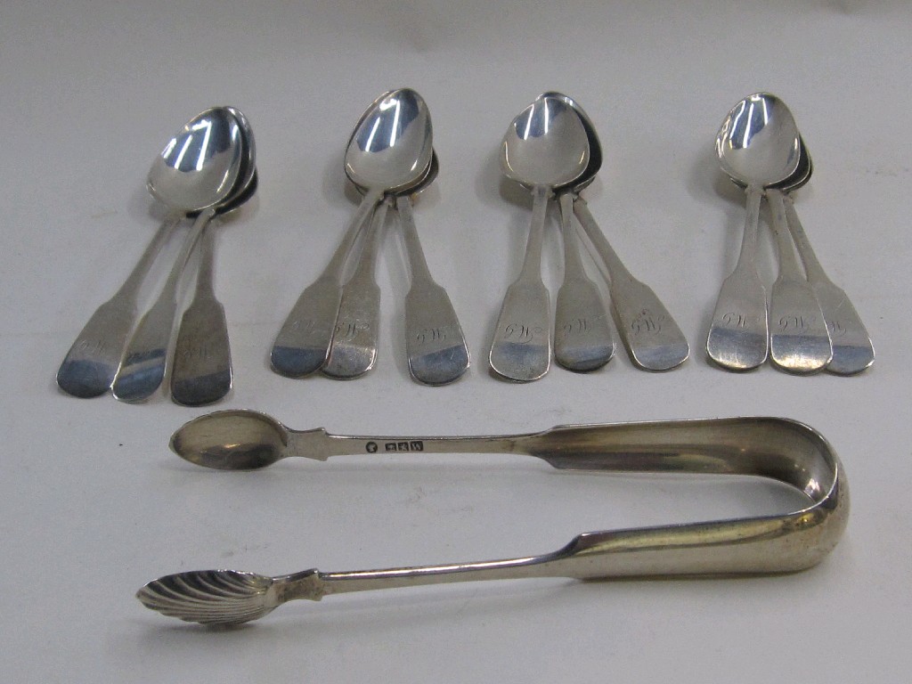 Appraisal: Lot comprising twelve Georgian silver spoons and a pair of