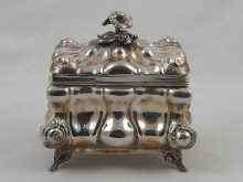 Appraisal: A white metal tests silver tea caddy with gilt interior