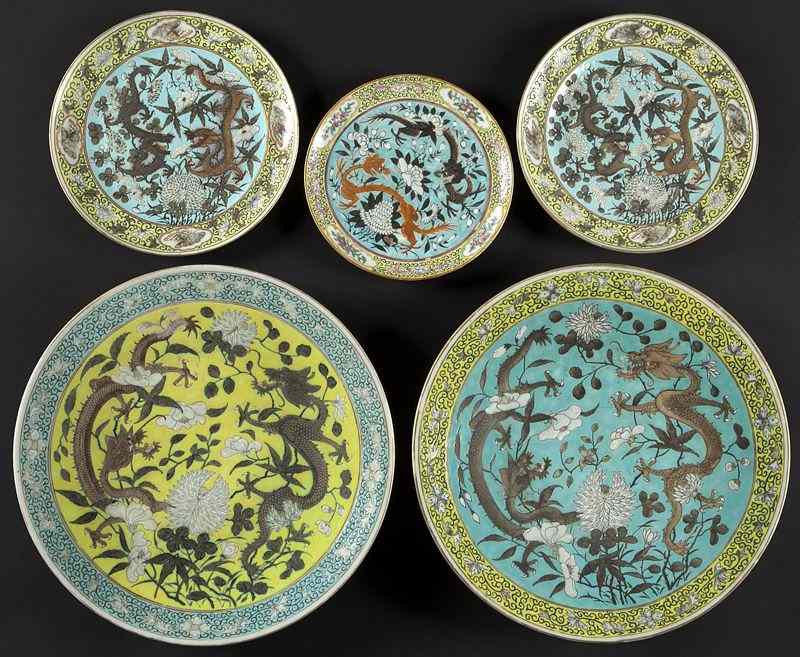 Appraisal: Chinese Qing Da Ya Zhai style yellow porcelainplates depicting dragons