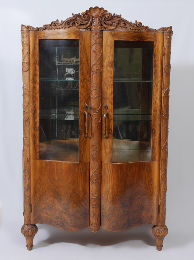 Appraisal: FRENCH WALNUT CURVED GLASS CURIO Serpentine front and bowed sides