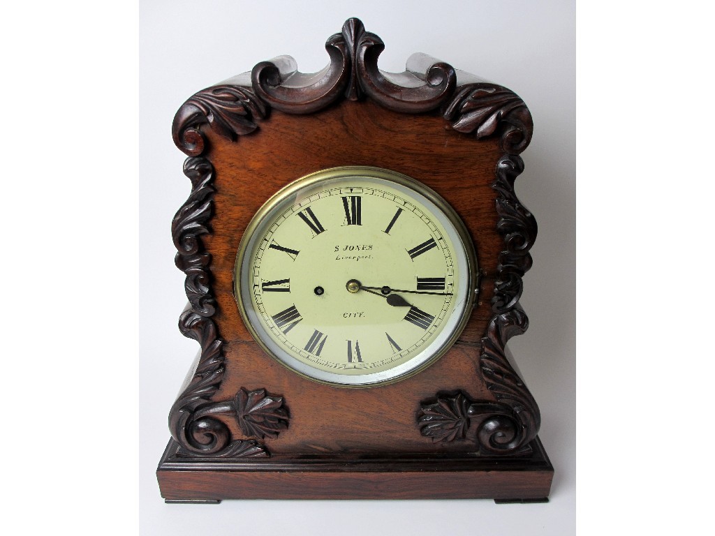 Appraisal: A mid Victorian rosewood bracket clock and bracket the dial