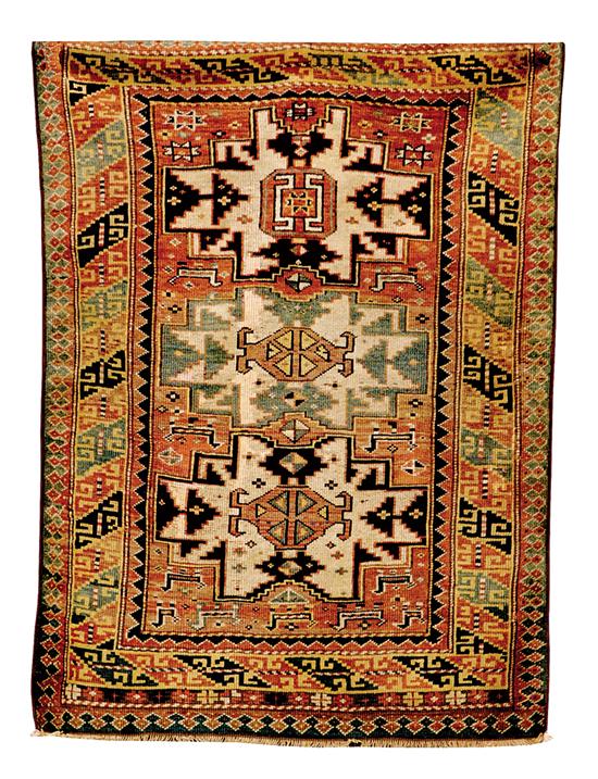 Appraisal: Antique Kazak carpet ' x ' Condition Good repair about