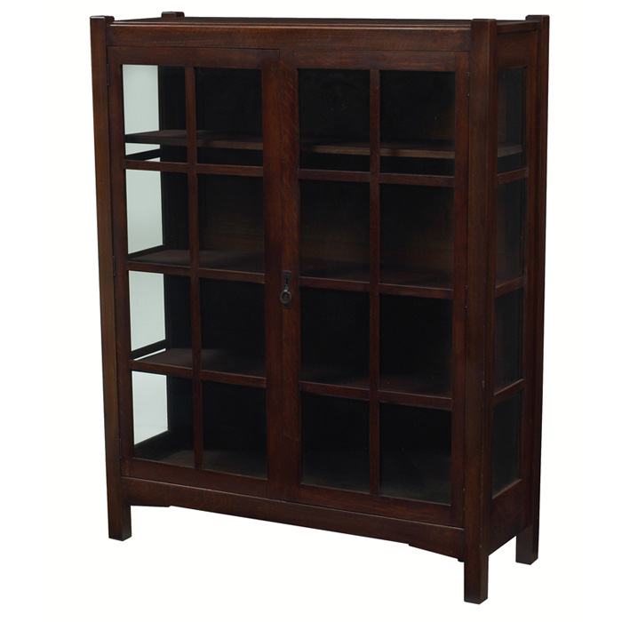 Appraisal: Arts Crafts china cabinet two-door form with eight divided sections