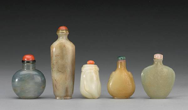 Appraisal: Five jade snuff bottles The first two undecorated one in