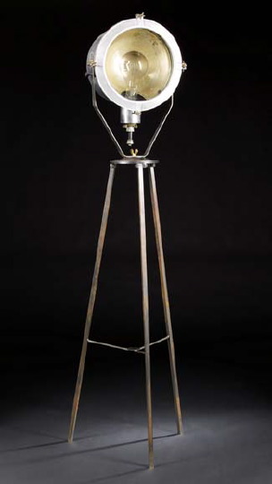 Appraisal: French Industrial-Design Brushed Steel and Cast-Iron Spotlight-on-Stand the pivoting reflector