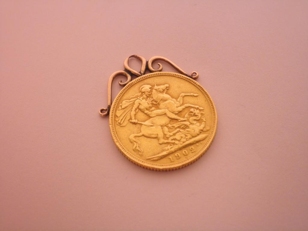 Appraisal: A sovereign with gold pendant mount