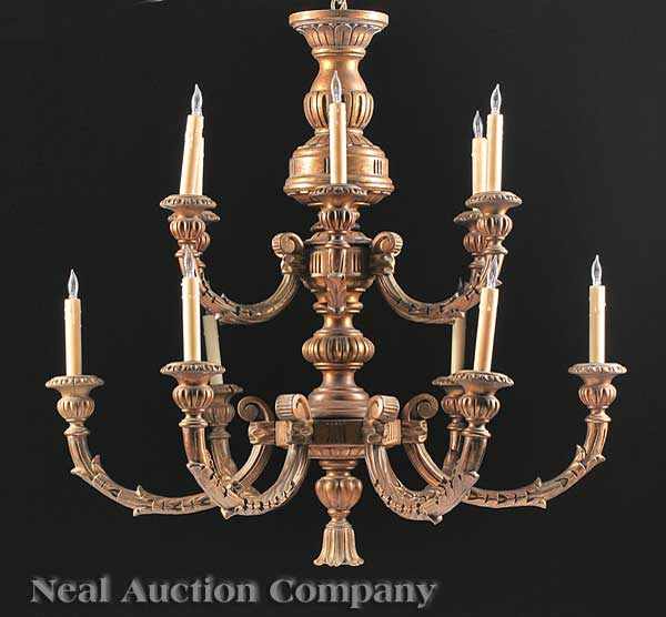 Appraisal: A Louis XVI-Style Carved Giltwood Chandelier vasiform stem issuing twelve