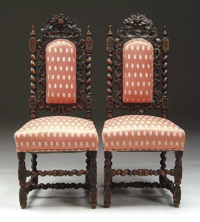 Appraisal: PAIR OF ORNATELY CARVED OAK UPHOLSTERED SIDE CHAIRS Matching chairs