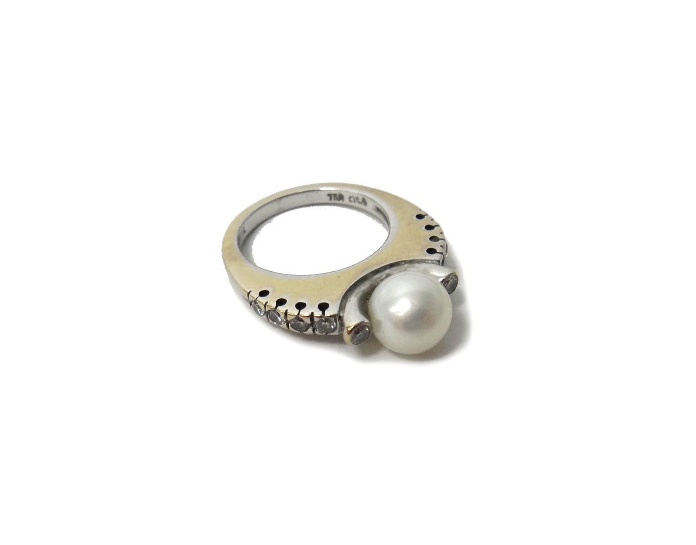 Appraisal: A white gold diamond and cultured pearl set ring mounted