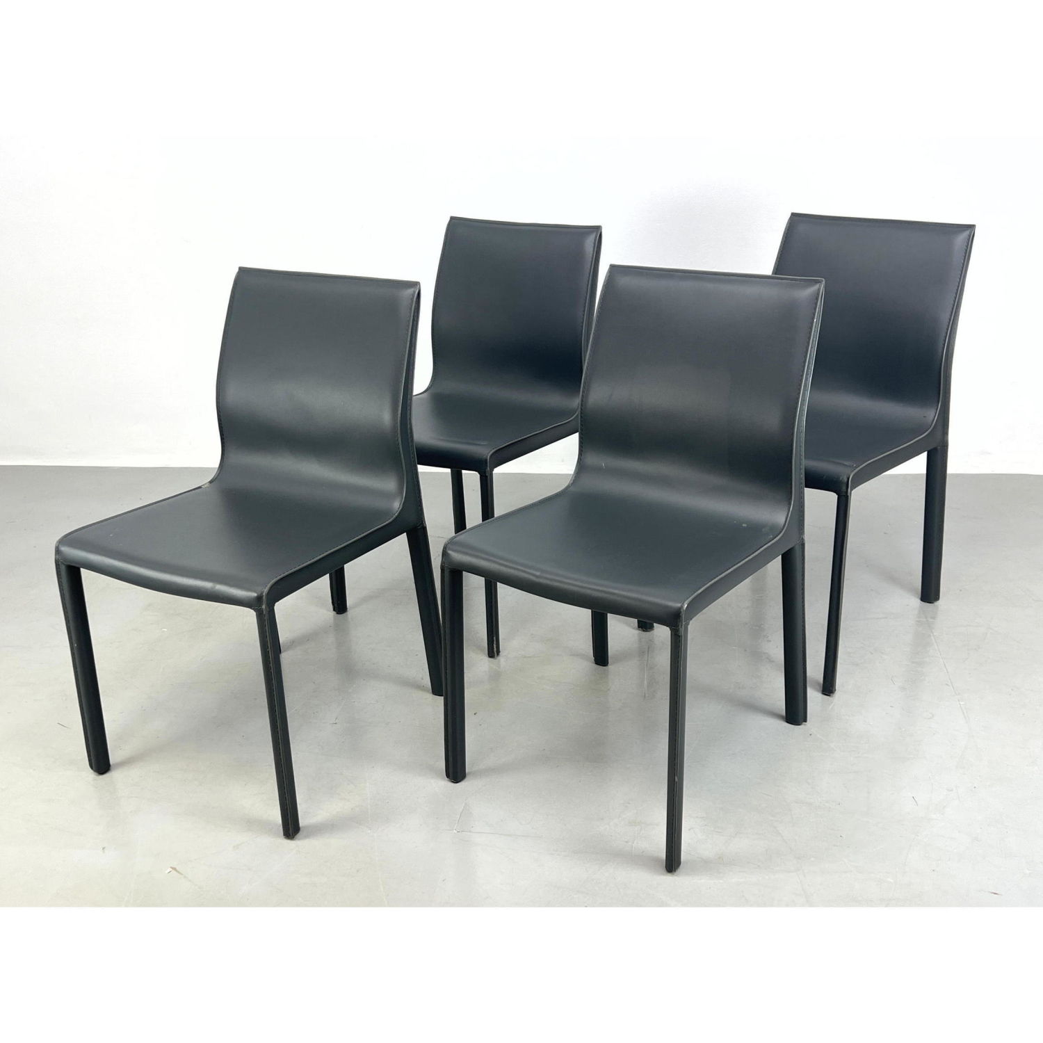 Appraisal: Set NUEVO Italian Leather Covered Dining Side Chairs Clean Lines