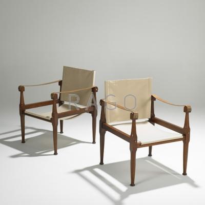 Appraisal: KAARE KLINT Pair of Safari chairs Teak canvas and brass