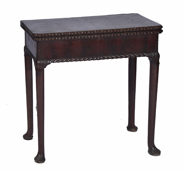 Appraisal: AN TH CENTURY MAHOGANY TEA TABLE the fold over rectangular