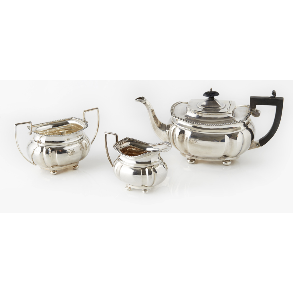 Appraisal: A three piece tea service S Blanckensee Sons Ltd Birmingham