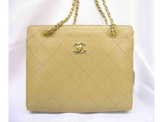 Appraisal: Chanel handbag never used Caviar gold leather retail with authenticity