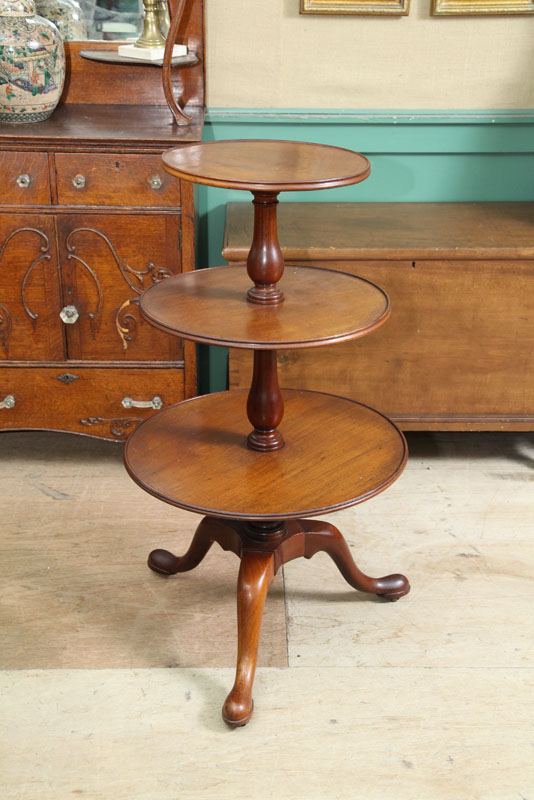 Appraisal: DUMB WAITER Walnut three tiered on a tripod base and