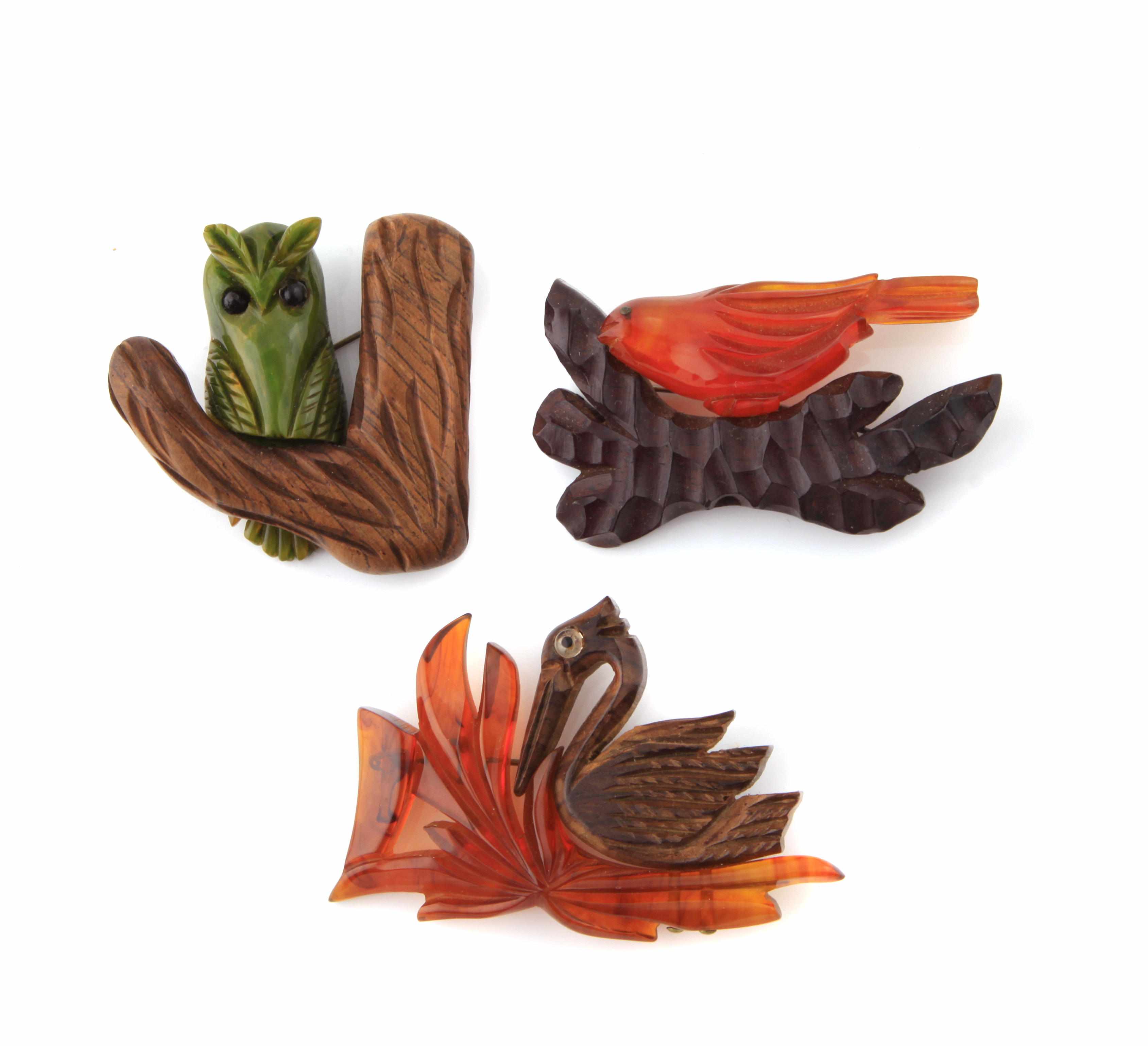 Appraisal: Three Bakelite and wood figural nature scenes each diameters in