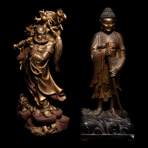 Appraisal: Two Chinese Gilt Wood Figures the first a Liuhai with