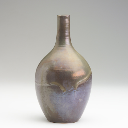 Appraisal: PEWABIC Bottle-shaped vase covered in green and purple matte lustered