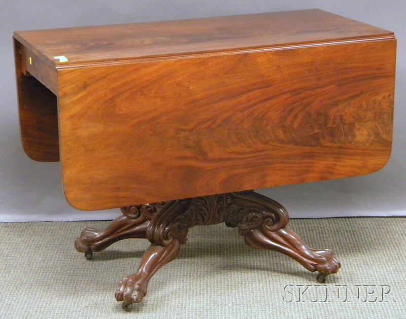 Appraisal: Empire Carved Mahogany and Mahogany Veneer Drop-leaf Pedestal-base Table ht