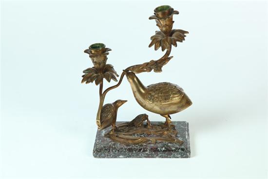 Appraisal: CANDLESTICK Probably Continental late th century Cast brass birds holding