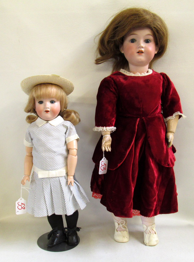 Appraisal: TWO BISQUE SOCKET HEAD DOLLS One by George Borgfeldt light