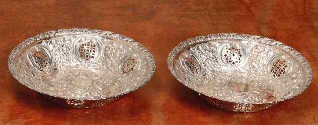 Appraisal: A PAIR OF LATE VICTORIAN SILVER DISHES with press and