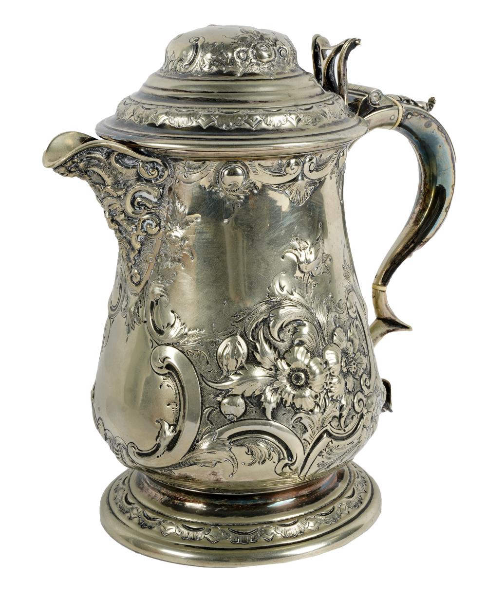 Appraisal: REPOUSSE SILVER-PLATE TANKARDmaker's mark N H and Co within a