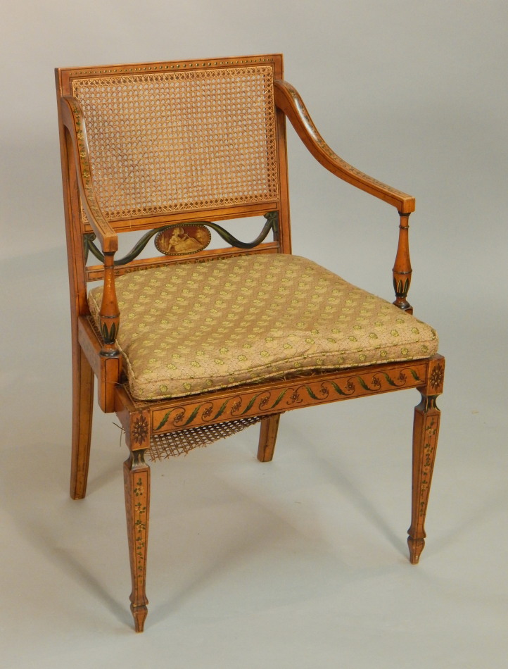 Appraisal: A late thC early thC Sheraton revival satinwood open armchair