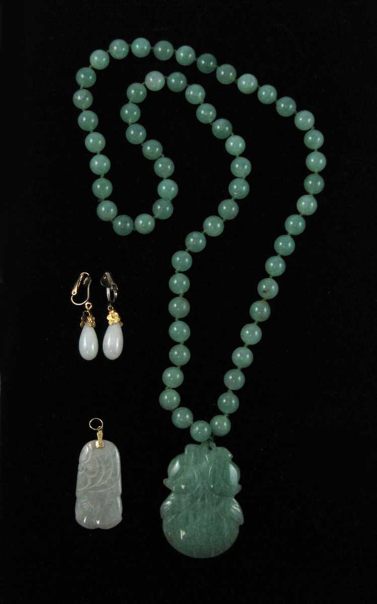 Appraisal: FOUR ARTICLES OF LIGHT GREEN HARDSTONE JEWELRY including a jade