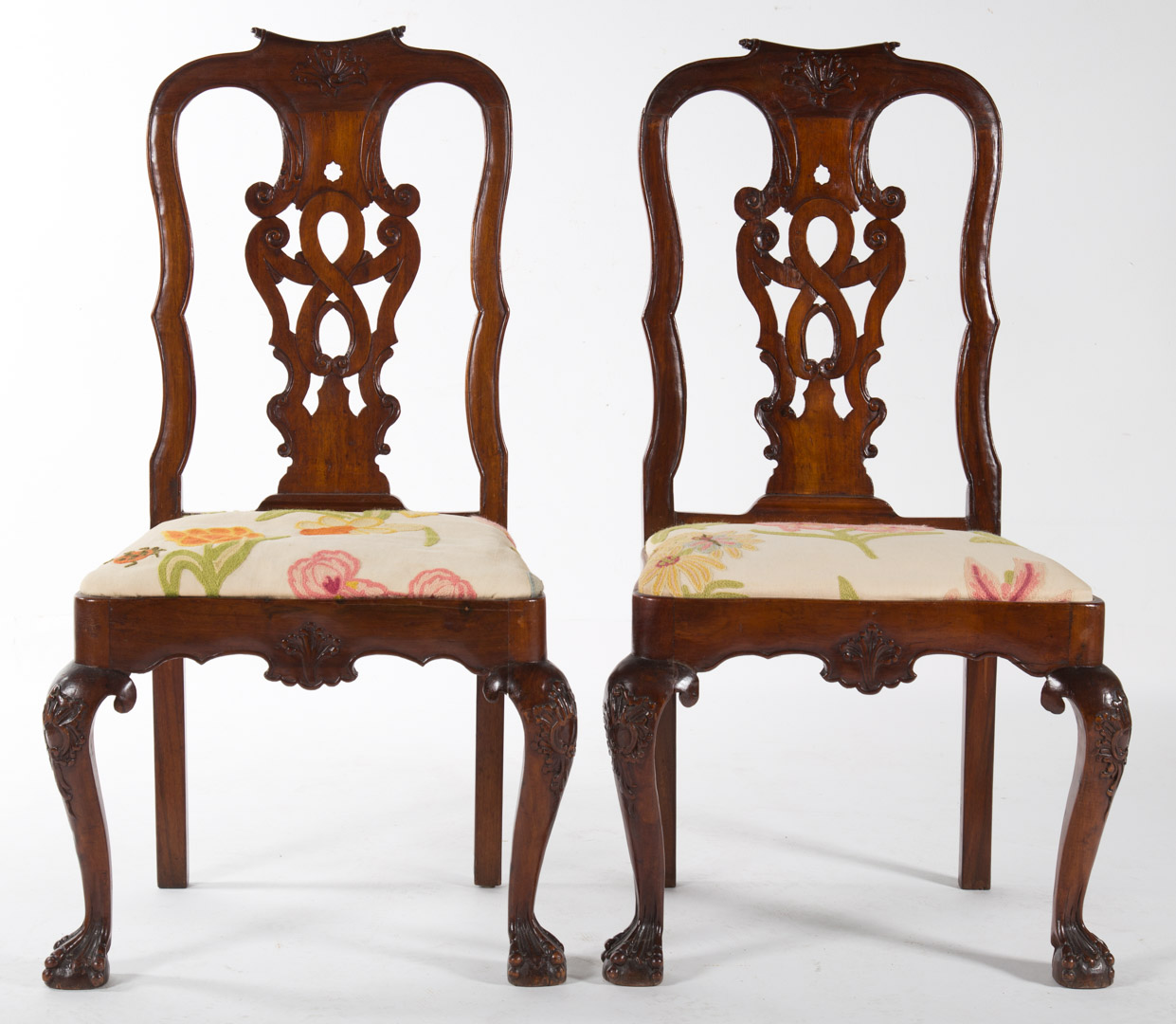 Appraisal: Pair George II Irish cherrywood side chairs circa yoke crest