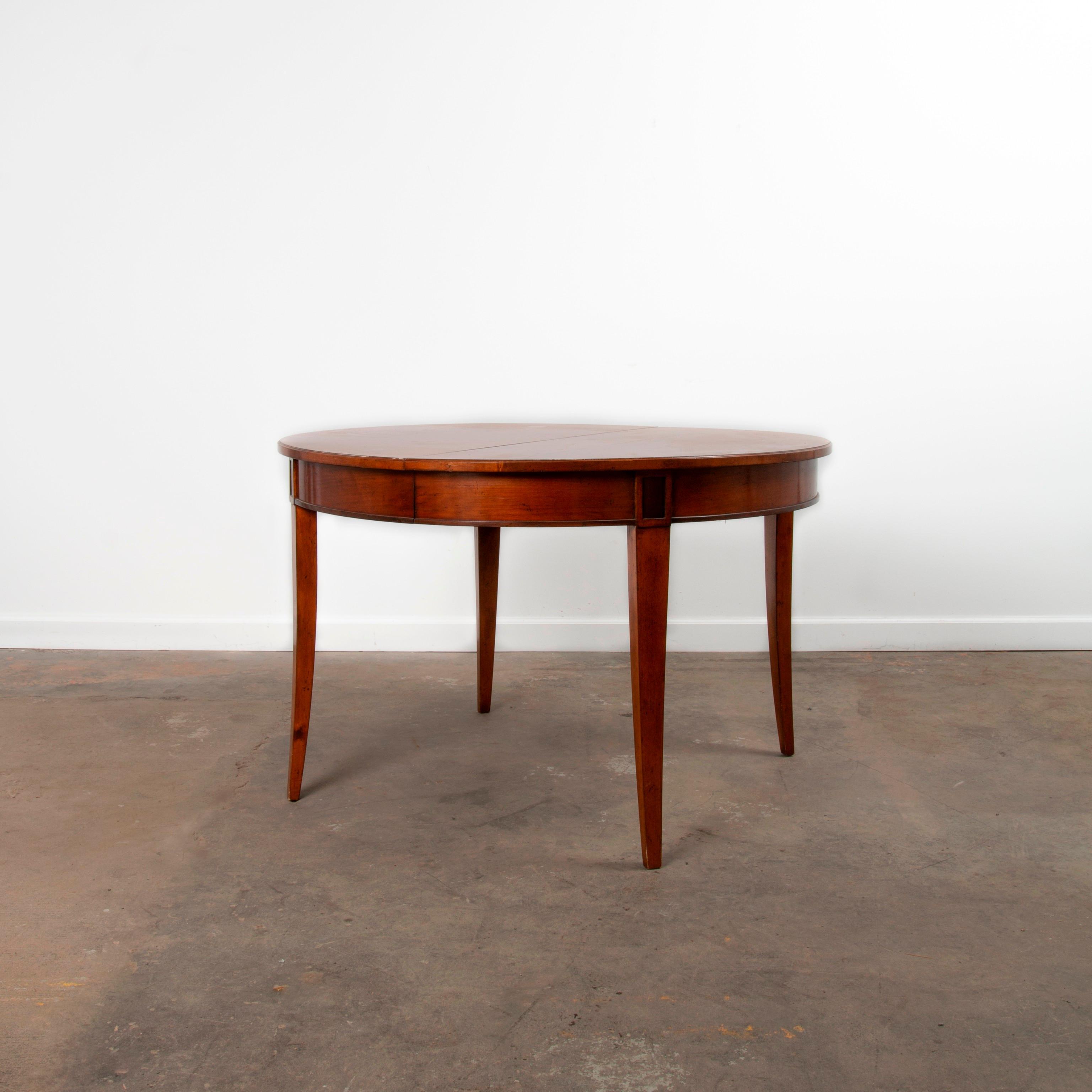 Appraisal: S FRENCH EXTENSION DINING TABLE A round French cherry dining