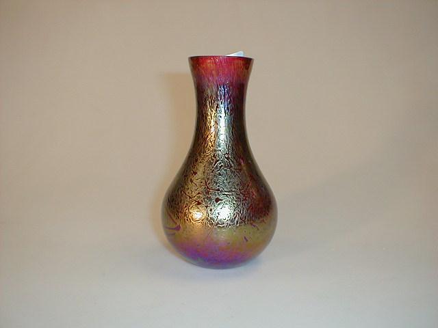 Appraisal: A red glass vase with lustre finish -