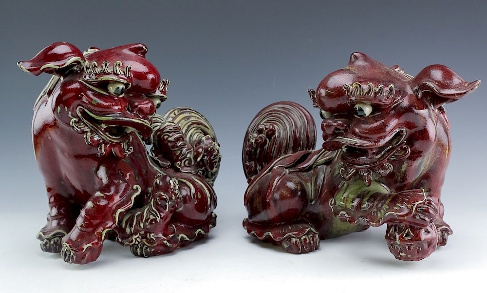 Appraisal: PR Chinese Export Porcelain Sang De Boeuf Foo Dogs Pair