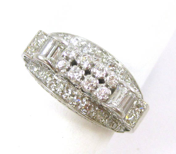 Appraisal: DIAMOND AND PLATINUM RING The platinum filigree setting with round-cut