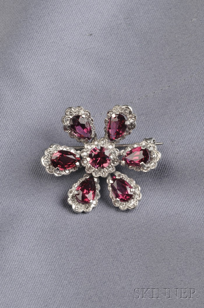 Appraisal: Platinum Garnet and Diamond Flower Brooch with circular and pear-shape