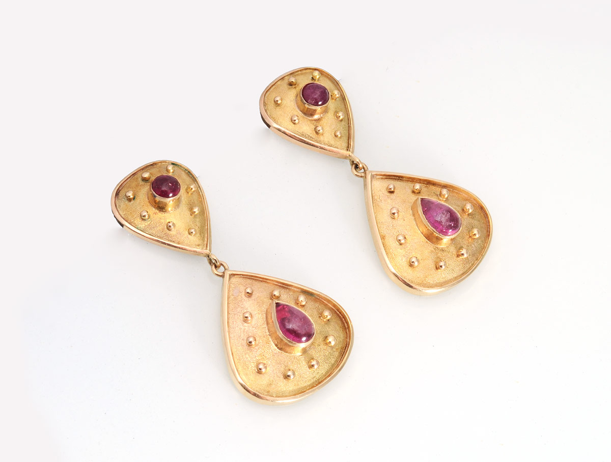 Appraisal: K TOURMALINE EARRINGS K yellow gold earrings containing round and