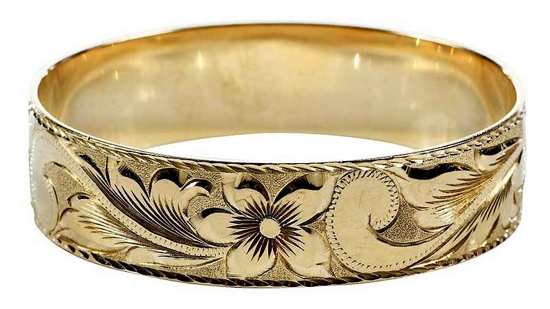 Appraisal: kt Gold Bangle Bracelet floral pattern stamped K and with