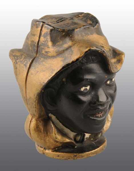 Appraisal: Cast Iron -Face Black Boy Still Bank Description Manufactured by